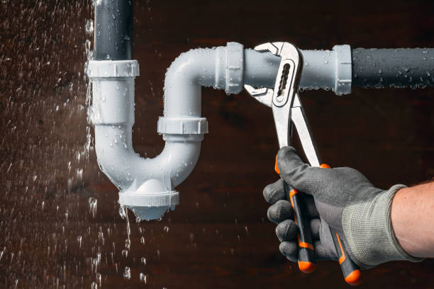 Professional Emergency Plumber technician working in Rockfield, IN